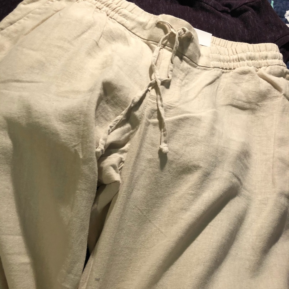 Two pairs of Beige and Black pants!!